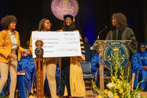 Students Present Check to Kinloch at Inauguration