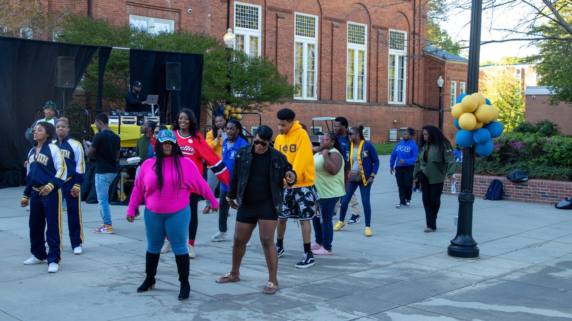 Students dancing during the post-Inauguration party on the block