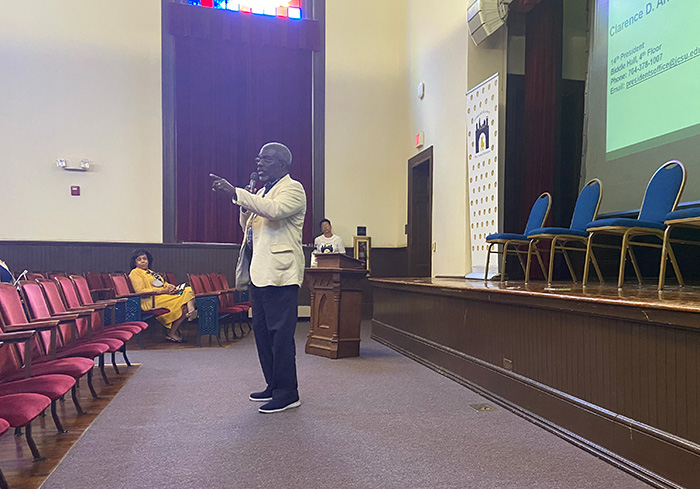 President Armbrister talks to prospective students at Golden Bull Academy