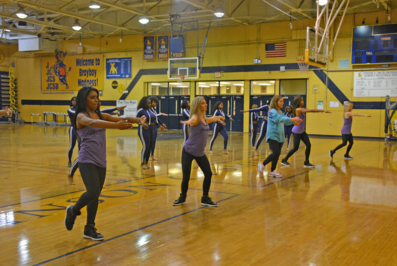 Golden Bullettes practicing with the Honey Bees in Brayboy Gym