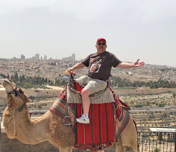 Kendal Mobley riding a camel