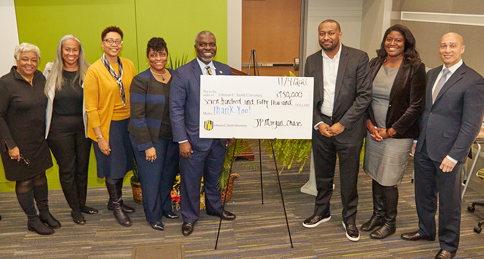 School officials with check from Chase Bank