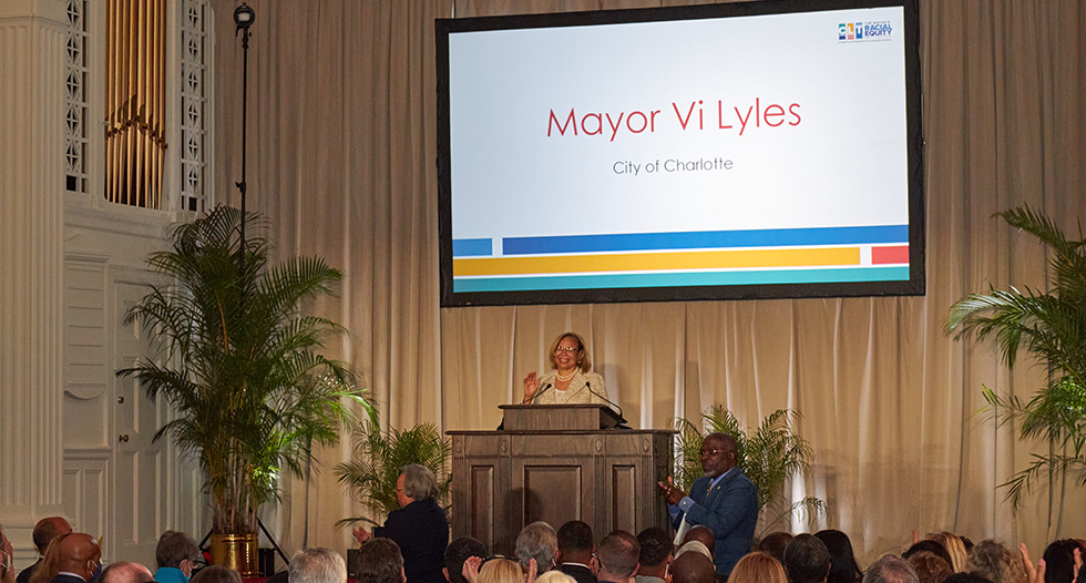 Mayor Vi Lyles talking at the MREI event