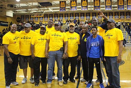 Group photo of the Lumber Company in Brayboy Gymnasium