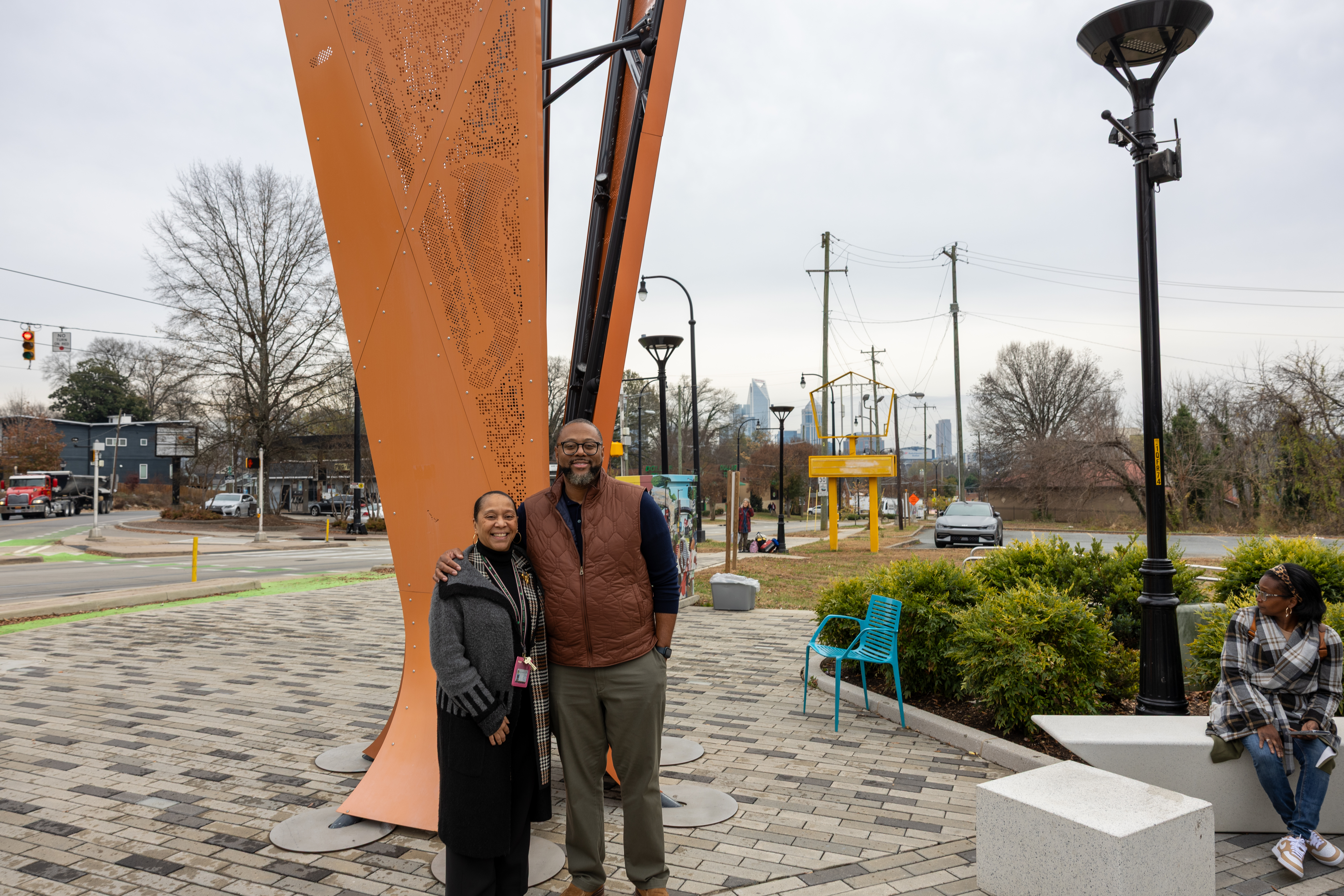 Utley and Dr. Spriull pose next to his work