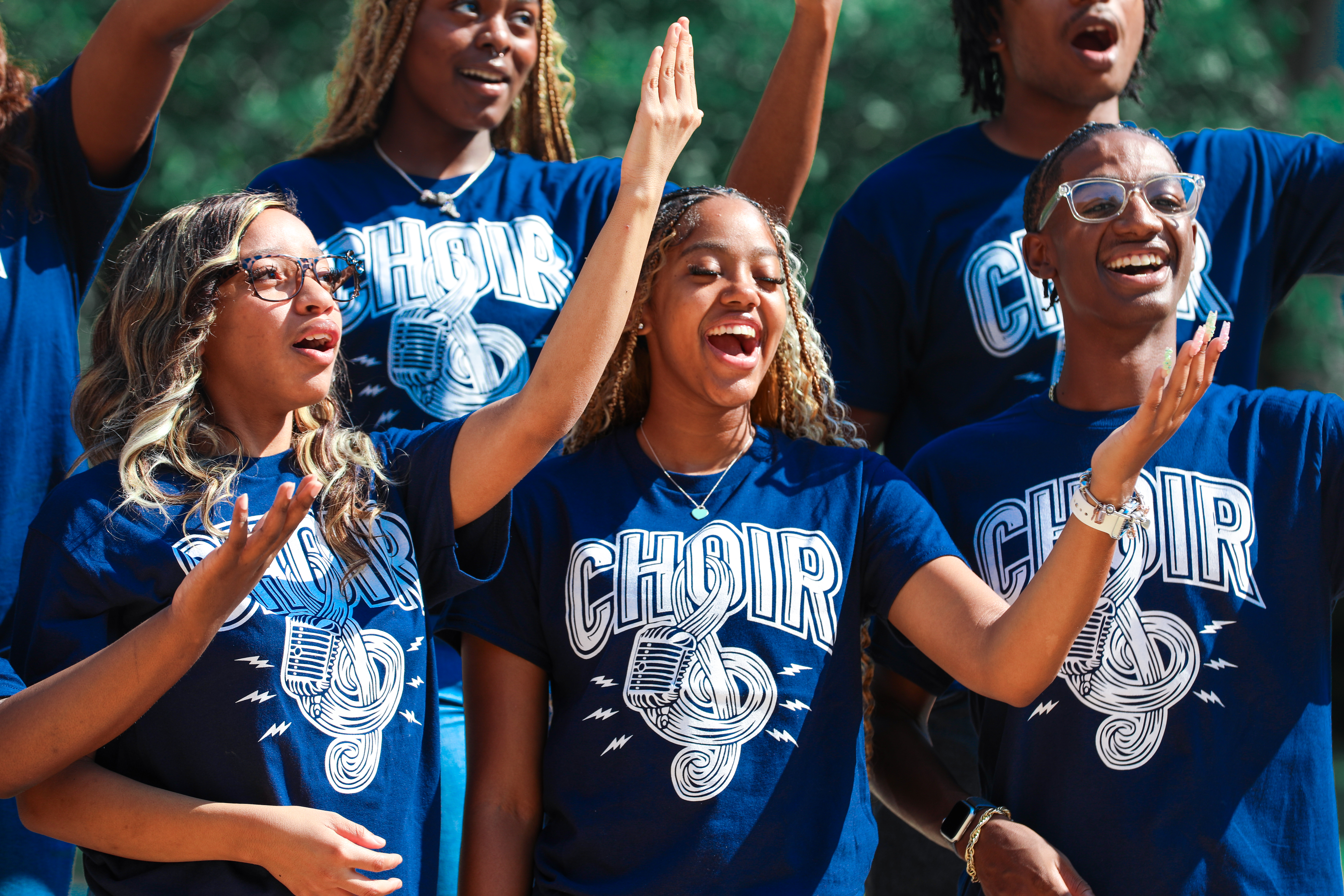 Choir singing in t-shirts