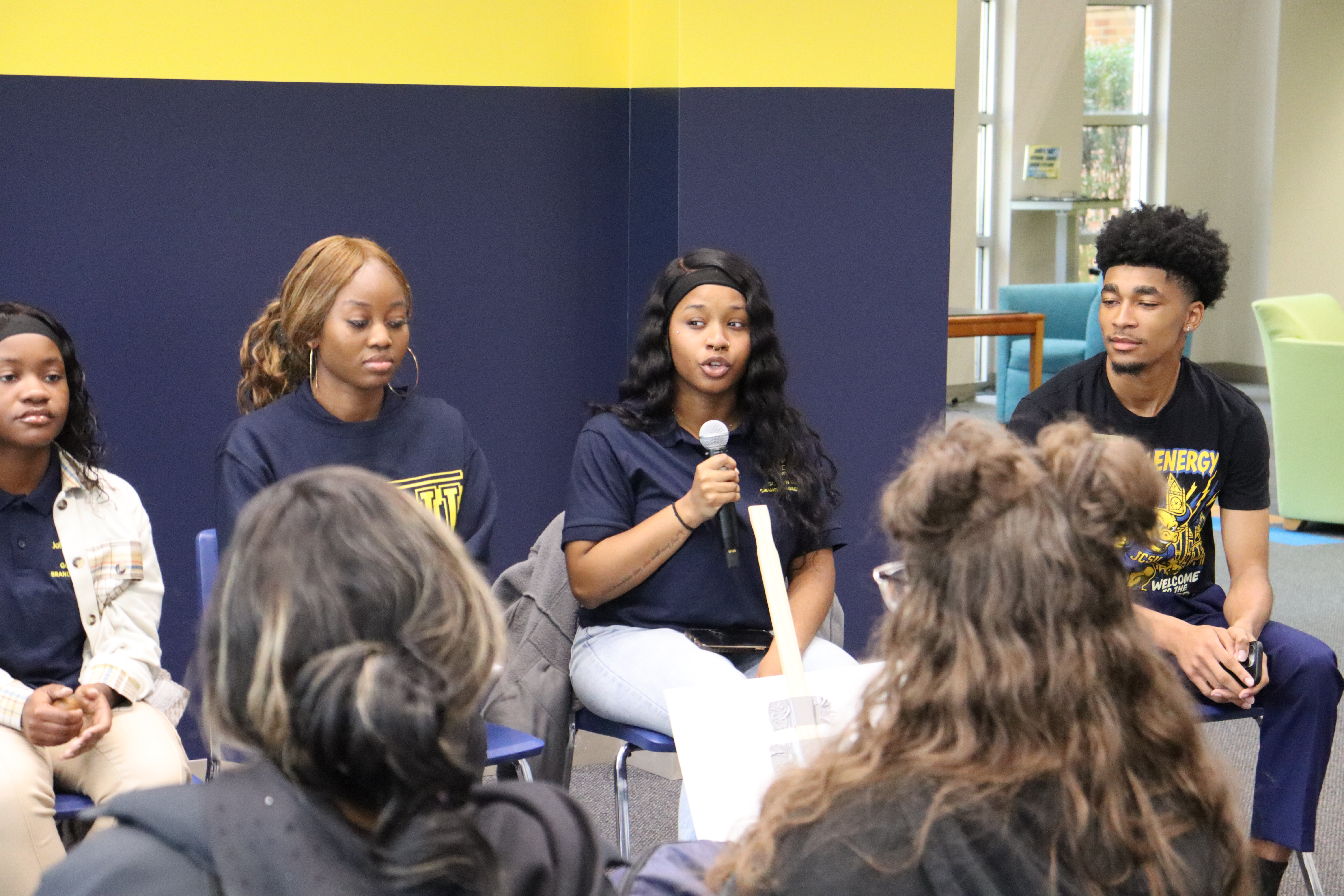 Student Speaking at a mic