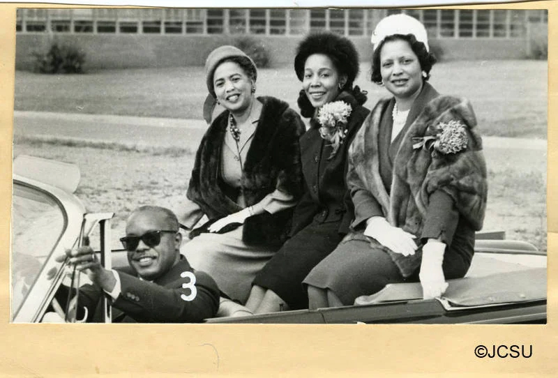 A parade float carrying three former Homecoming Queens. Inez Moore Parker Archives, Johnson C. Smith University · SASLHomPar48
