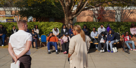 Bunzey and Lima-Neves address the crowd
