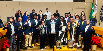 Group shot in the County Council Chambers