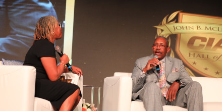 Stroud on stage being interviewed