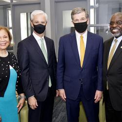Mayor Vi Lyles, Wells Fargo CEO Charlie Scharf, N.C. Governor Roy Cooper, and President Armbrister pose for a photo after the event