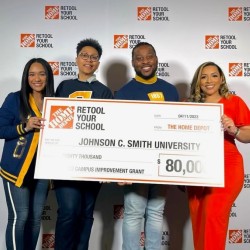 Group photo with check home depot