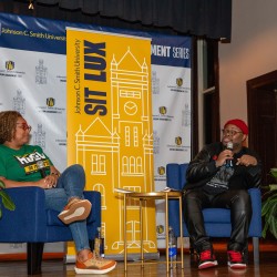 Dr. Terza Lima-Neves talking to Dr. Frederick V. Engram, Jr. '05 during the Lyceum