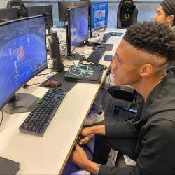 Student playing desktop game