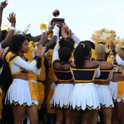 Team Celebrates with the Commemorative CLassic Trophy