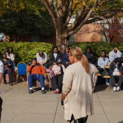 Bunzey and Lima-Neves address the crowd