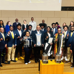 Group shot in the County Council Chambers