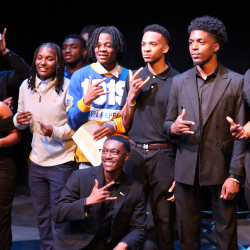 Student musicians performing in the theater