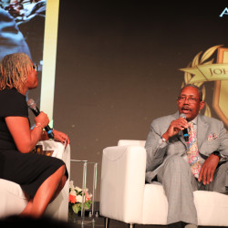 Stroud on stage being interviewed