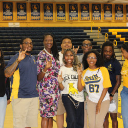 Photo of a group of students and President Kinloch at GBA