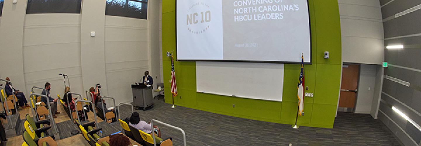 Wide shot of the NC 10 conference in the New Science Center