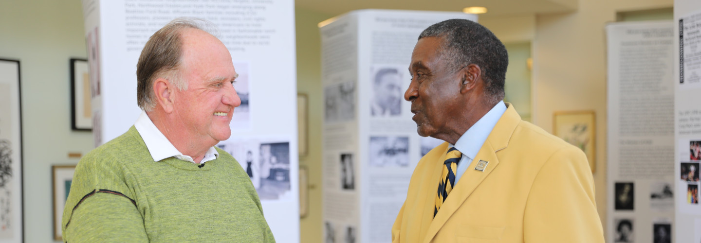 Rick Webb, President of the North Carolina Sports Hall of Fame Board of Directors, and Robert “Boo” Johnson, JCSU legend, 1969 CIAA champion, and proud member of the 100 Club.