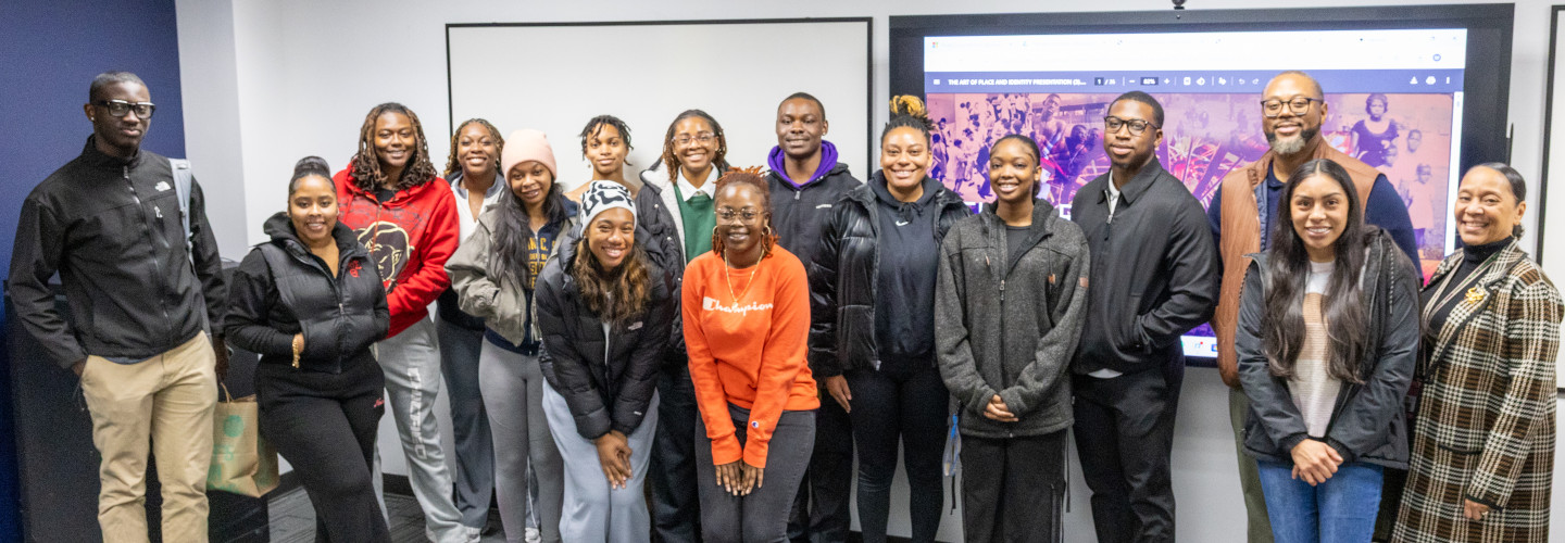 Group shot of students with Utley