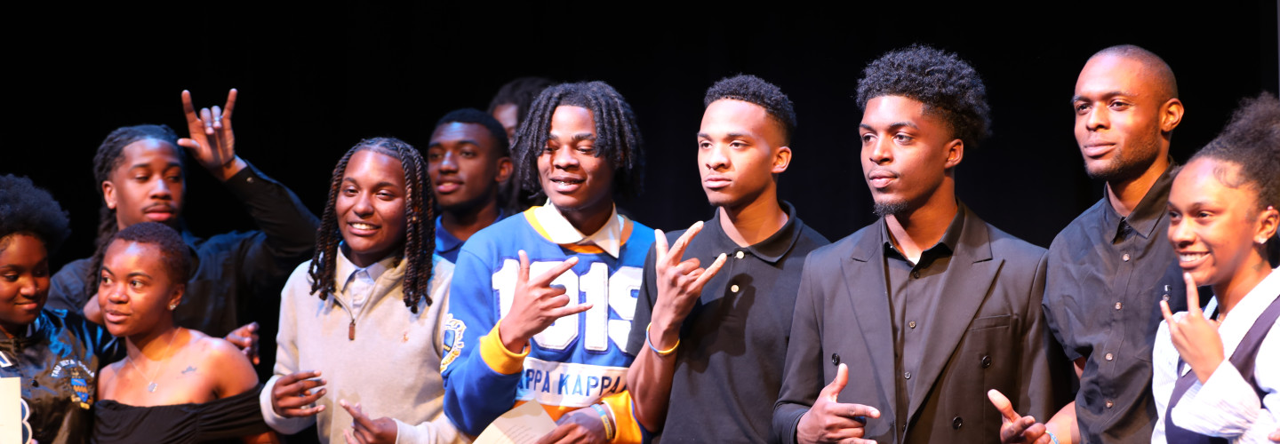 Student musicians performing in the theater