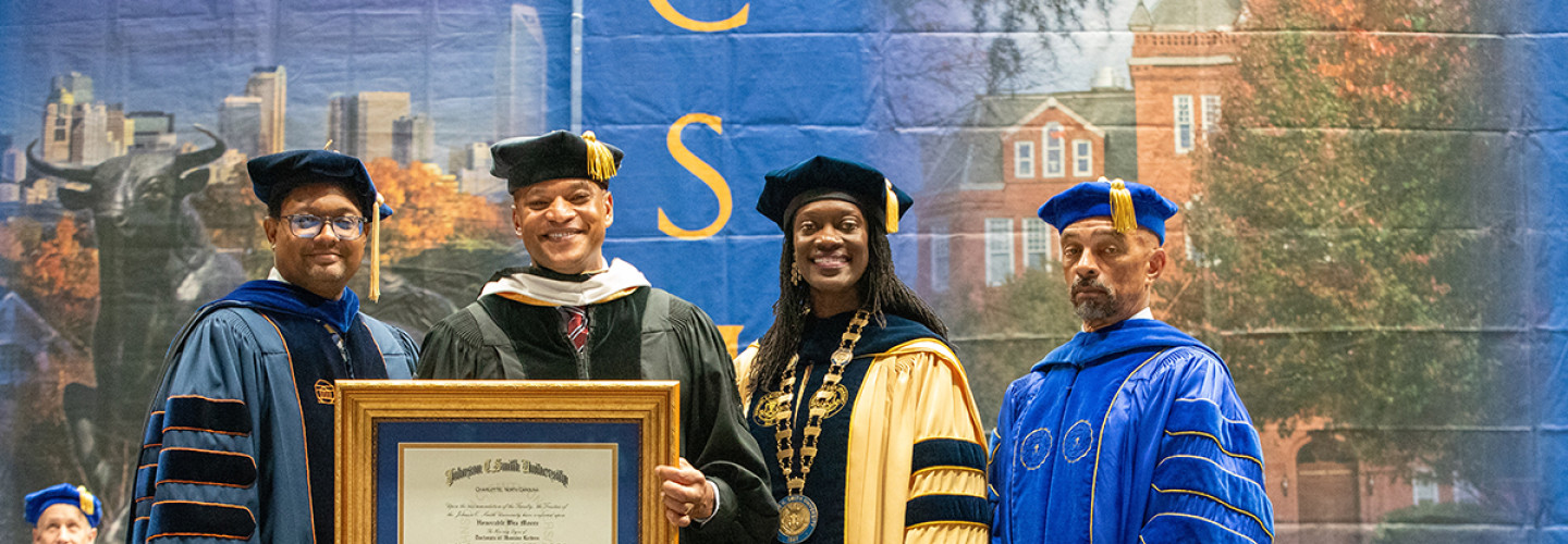 Wes More receiving his honorary diploma