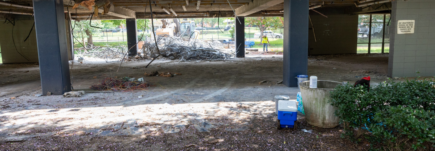 Photo of bulldozer clearing out Liston Hall lobbies