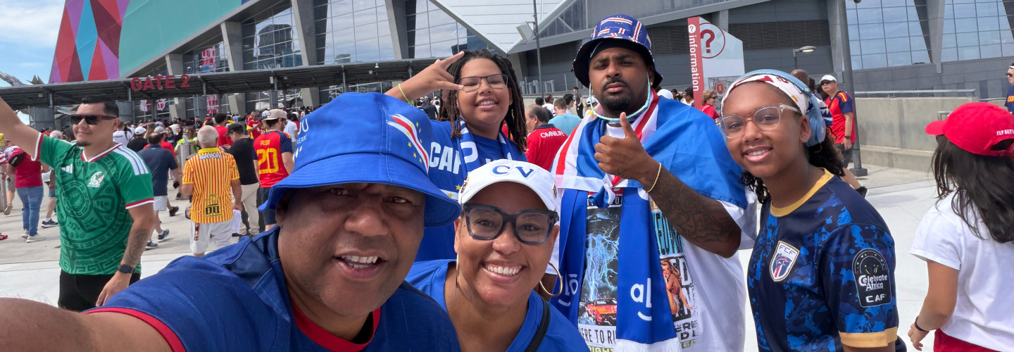 Dr. Terza Lima Neves' group posing outside the Atlanta stadium at the World Cup 2026
