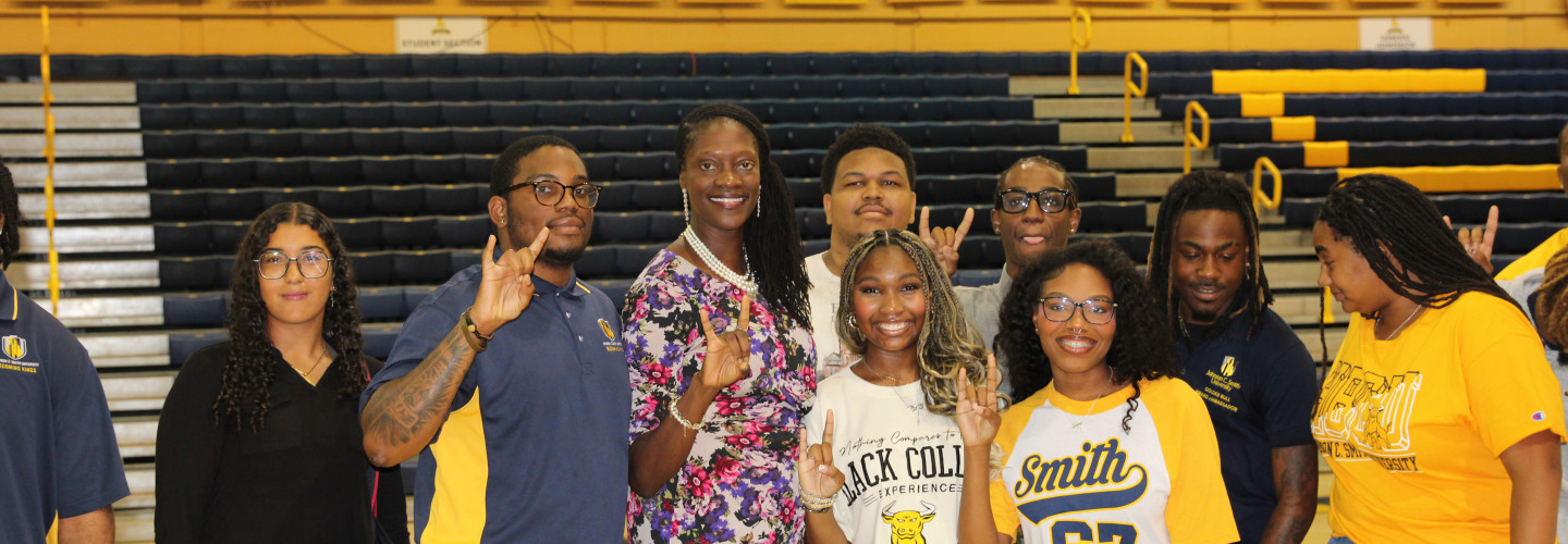 Photo of a group of students and President Kinloch at GBA