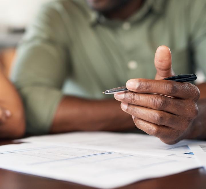 Couple signing documents