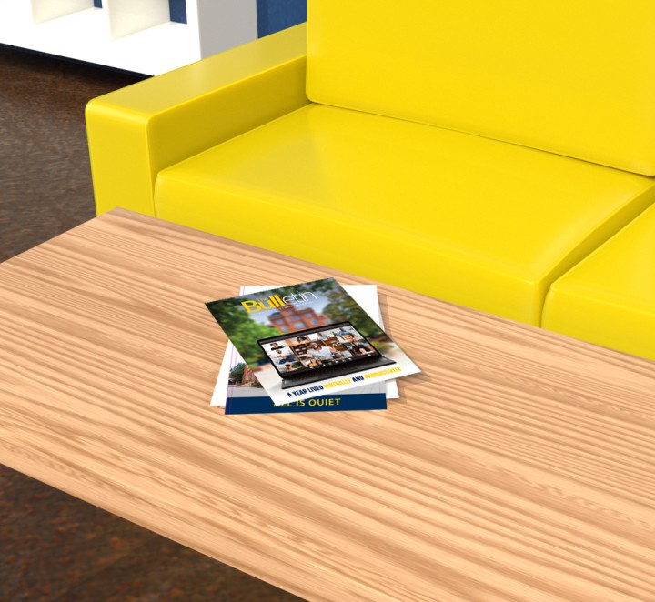 Rendering of a yellow couch with a coffee table which has copies of JCSU's magazine "The Bulletin" on it