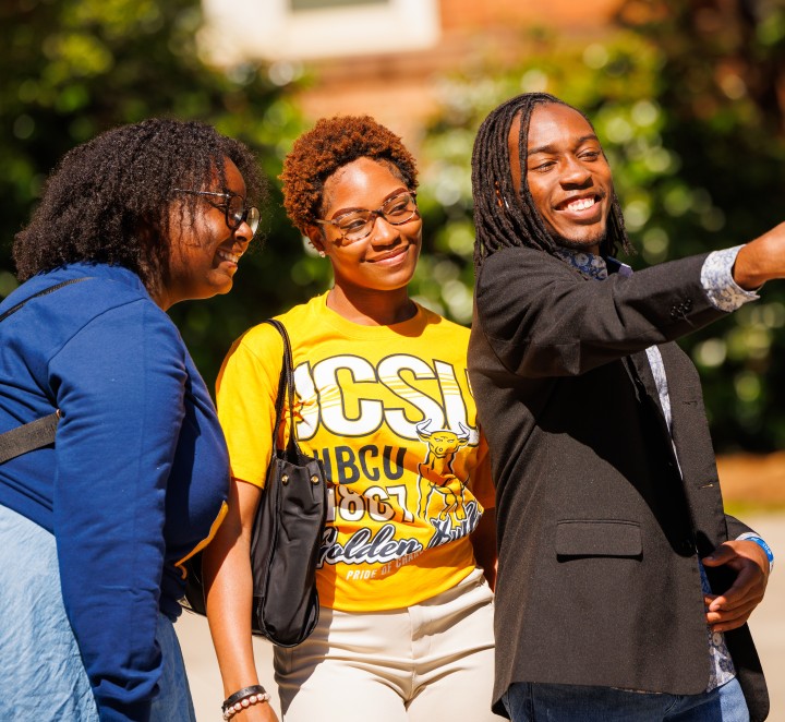 Photo of three students taking a selfie