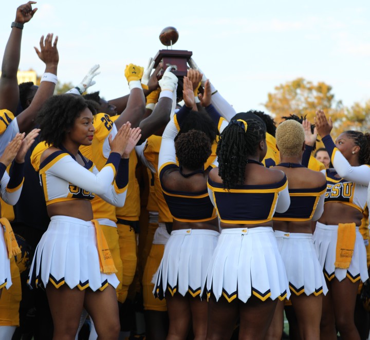 Team Celebrates with the Commemorative CLassic Trophy