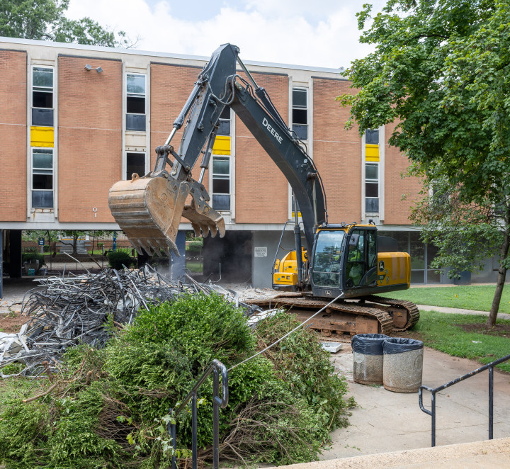 Backhoe begins process of tearing down Liston Hall