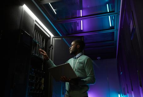 Computer engineer working in a server room