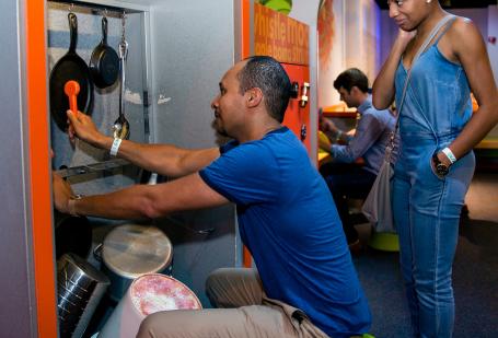 Couple engaging with an exhibit at Discovery Place