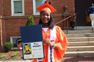 Student from steele creek prep school graduation