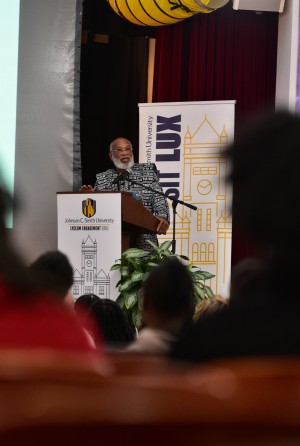 Chester Higgins Jr speaking to crowd at JCSU.jpg