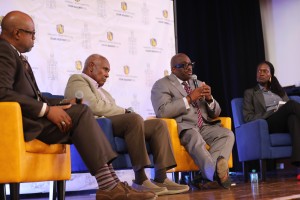 The platform party on the stage during the event The Way Forward