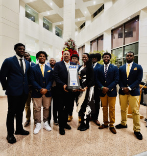 JCSU group poses with the trophy
