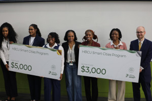 Check presentation during ceremony at Tech Day 2026