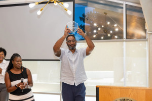Lex Bibbs was given a momento as a token of appreciation for his mentorship of students in the Becoming Kings Program