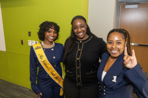 Students pose with Alexys Gabriel ’22 after the event