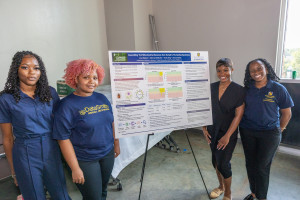 Students posing with their research