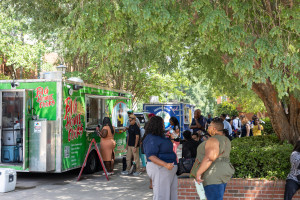 Faculty and Staff getting lunch on the block from food trucks