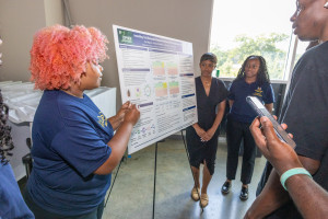 Students explaining research
